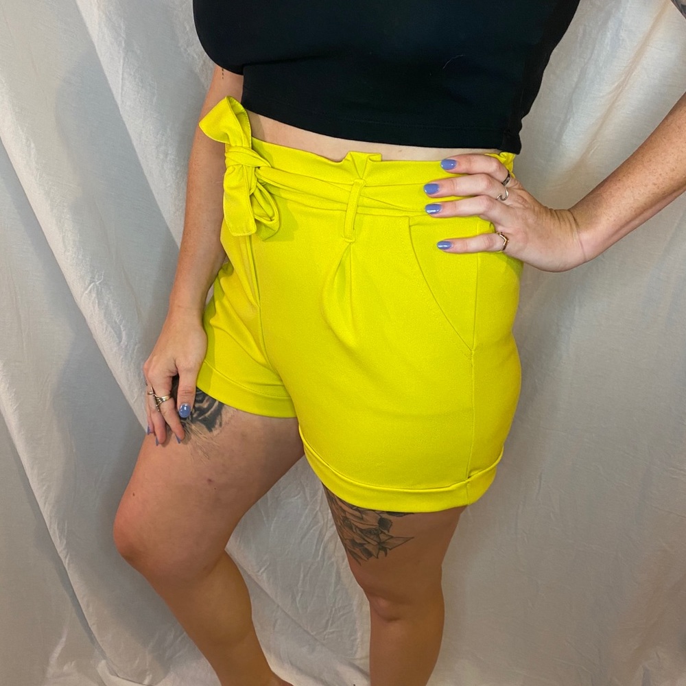 Bright yellow paper bag shorts